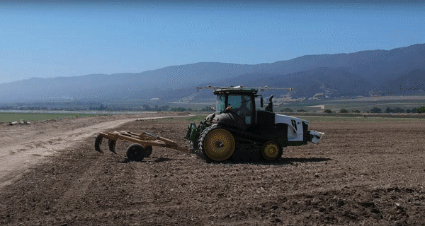 Sequence of images showing tractors working on fields 