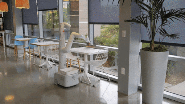 Robot cleaning a table